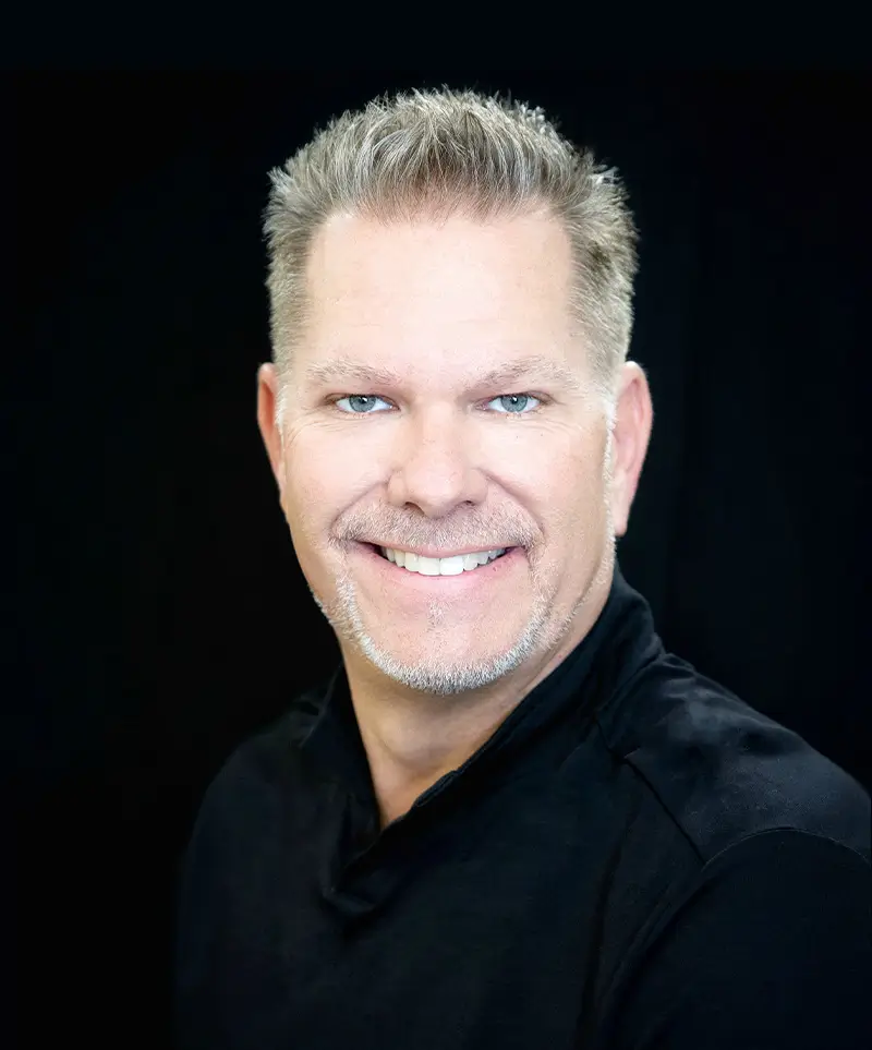 Professional headshot of Scott, founder and host of Raising the Bar AZ